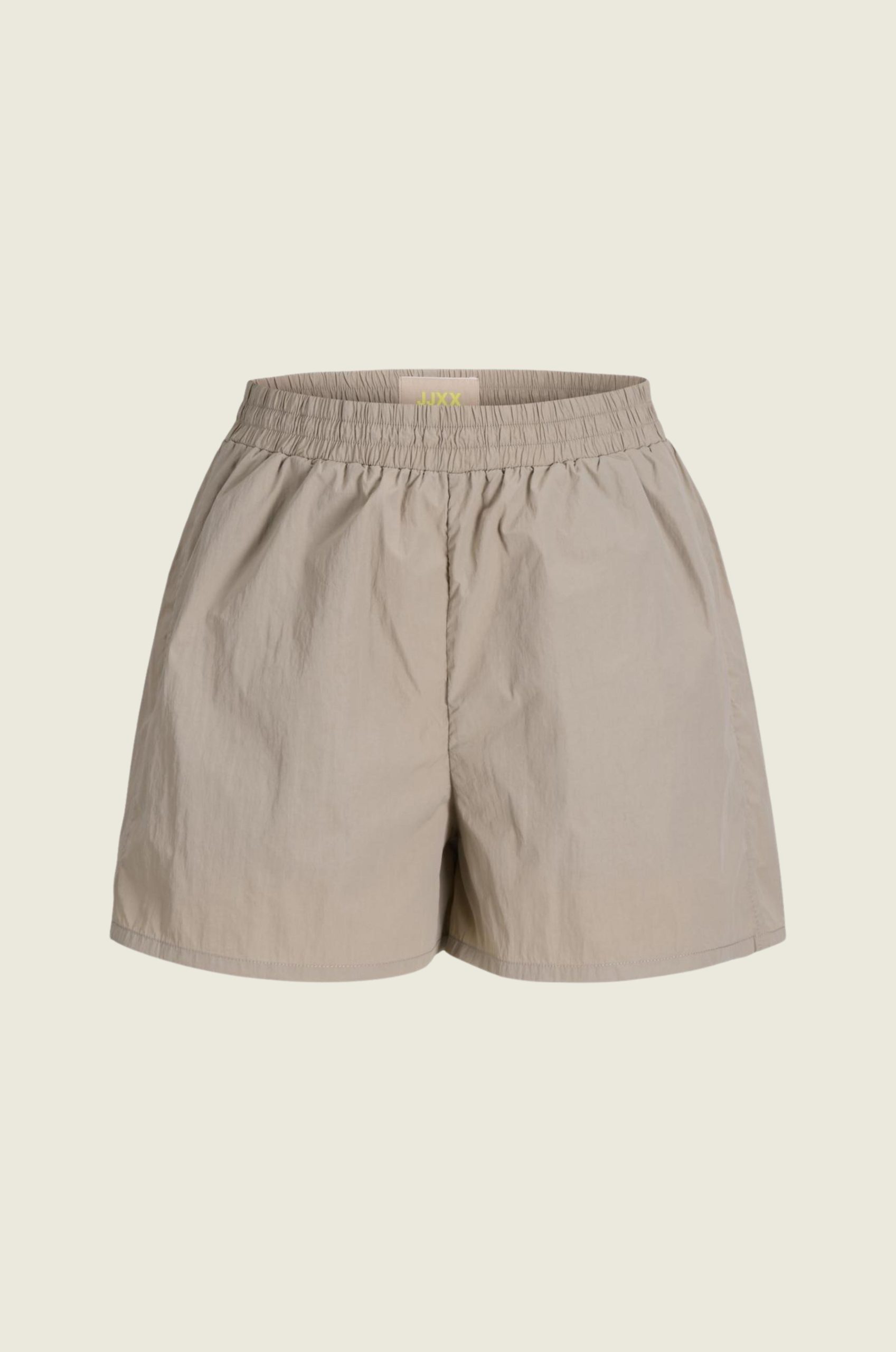 JXNILA_LIGHT_TRACK_SHORTS_OTW